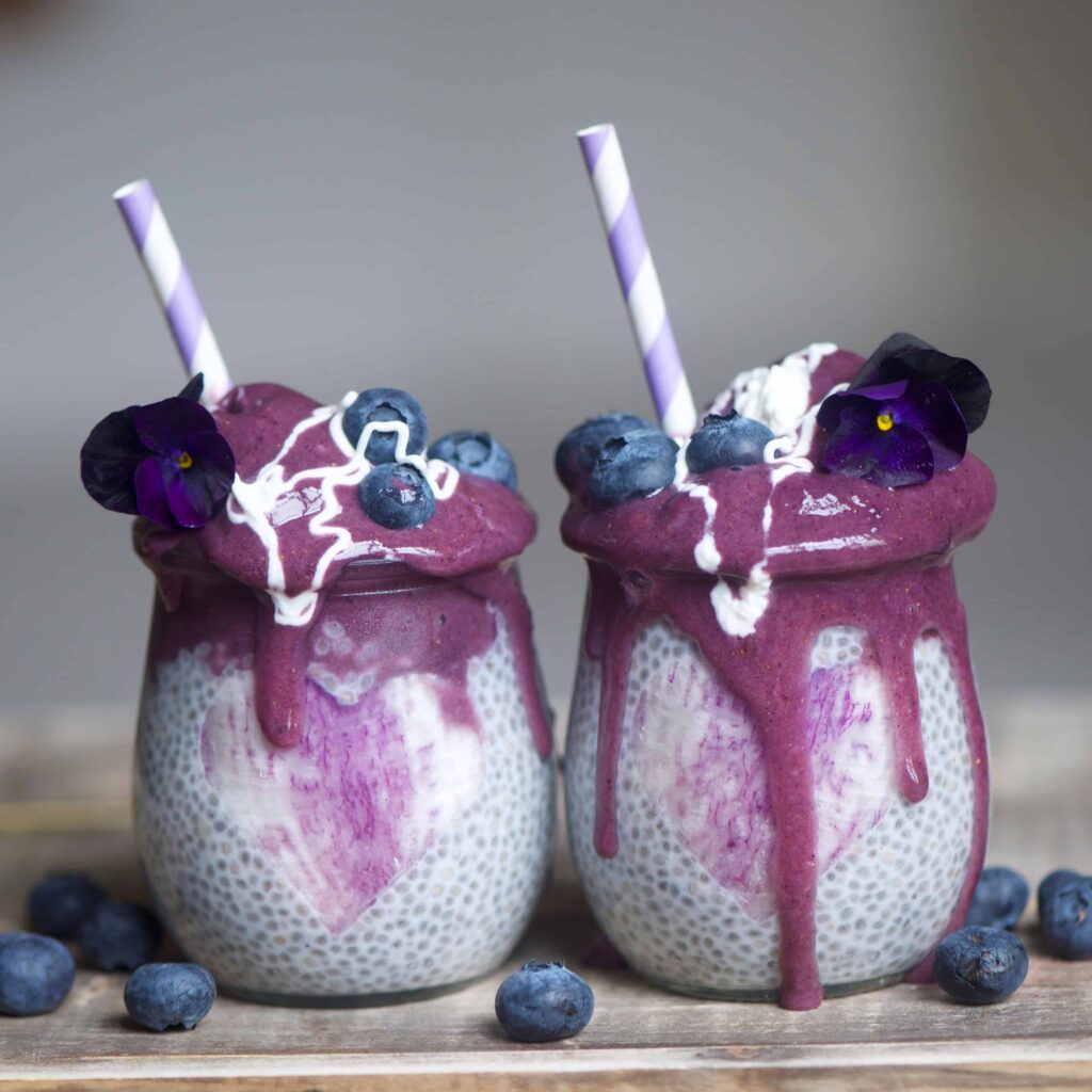 Maqui Berry Smoothie & Chia Pudding Jars topped with blueberries 