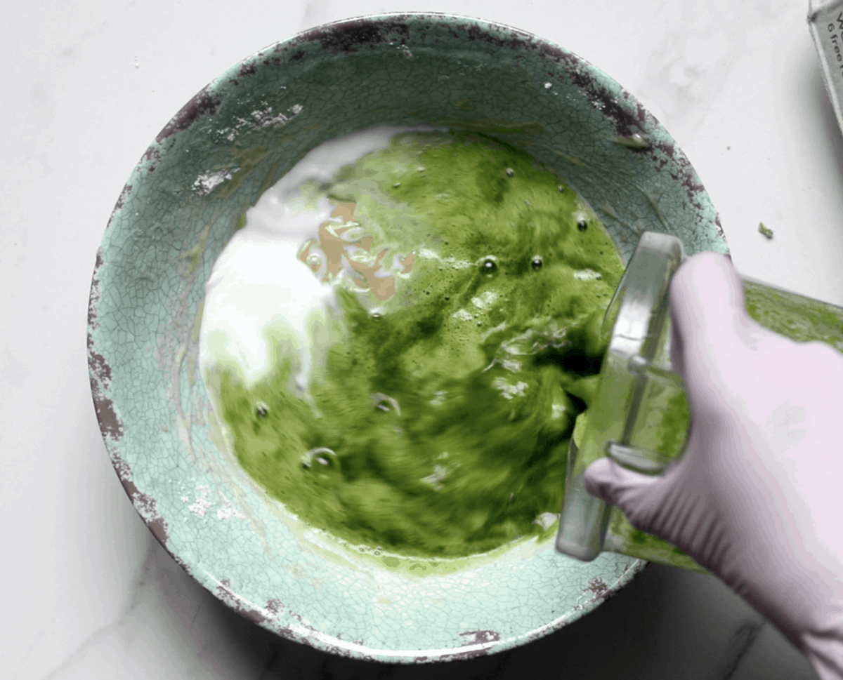 Adding blended kale to the waffle batter 