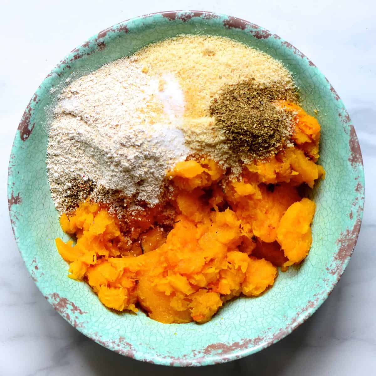 Baked butternut square and spices in a bowl