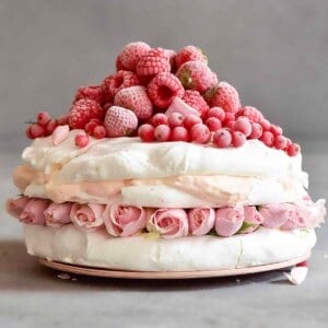 Eton mess meringue pavlova cake with berries and coconut cream