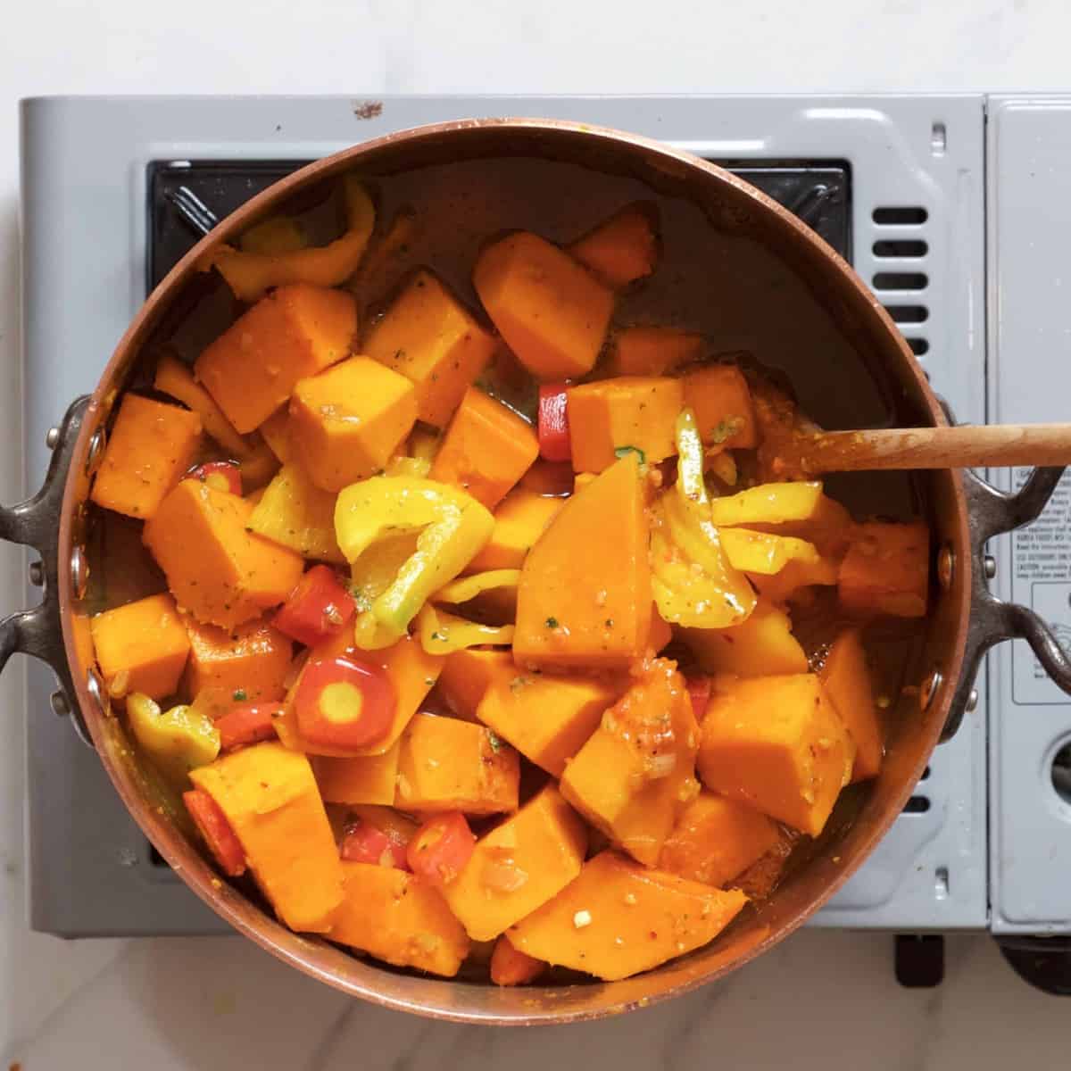 Making pumpkin soup in a pot