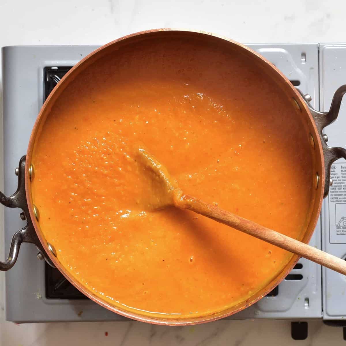Making pumpkin soup in a pot