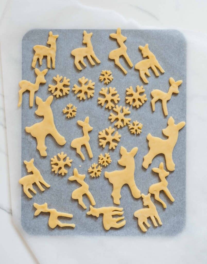 Christmas orange sugar cookies - bambi cookies, fawn and snowflake cookies, pastel colours