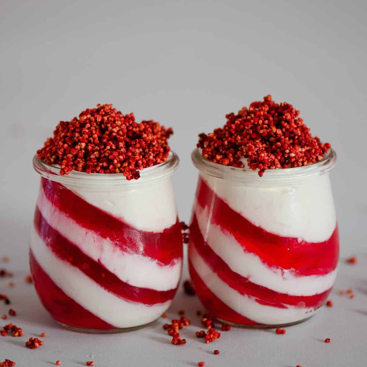 candy cane yogurt jelly jars topped with puffed quinoa