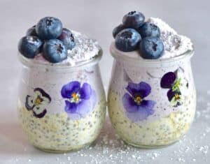 blueberry Overnight oats and blueberries in a jar
