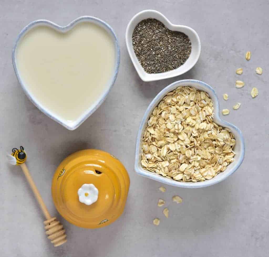 Overnight oats ingredients - oats, chia seeds, milk, honey