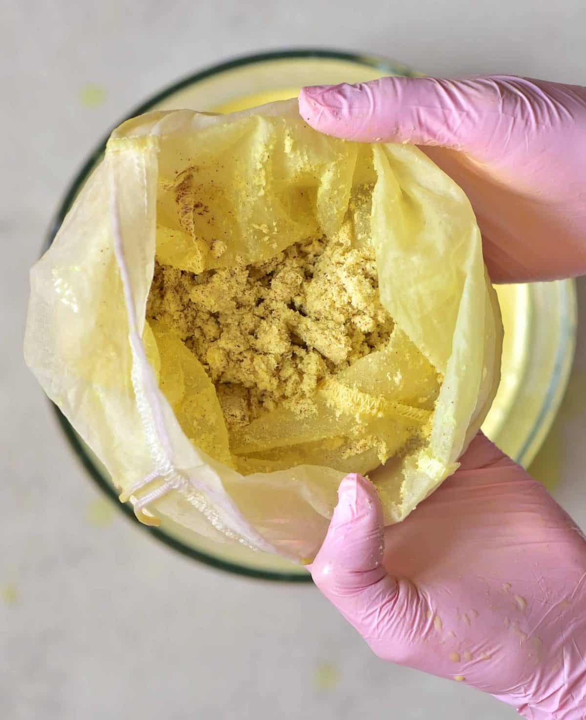 Golden milk - coconut and turmeric flesh passed through a nut milk bag