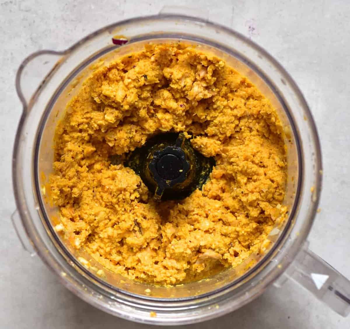 Orange falafel paste, obtained by using a baked butternut squash