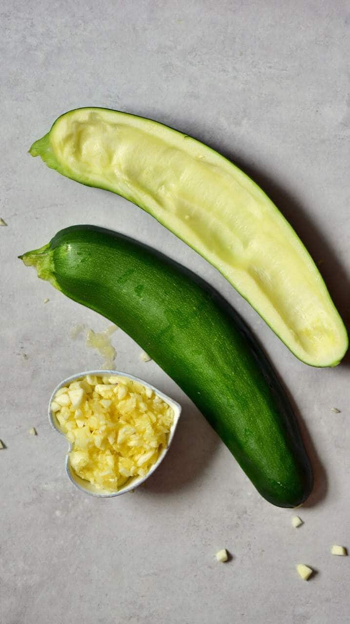 two halves of zucchini that are cored 