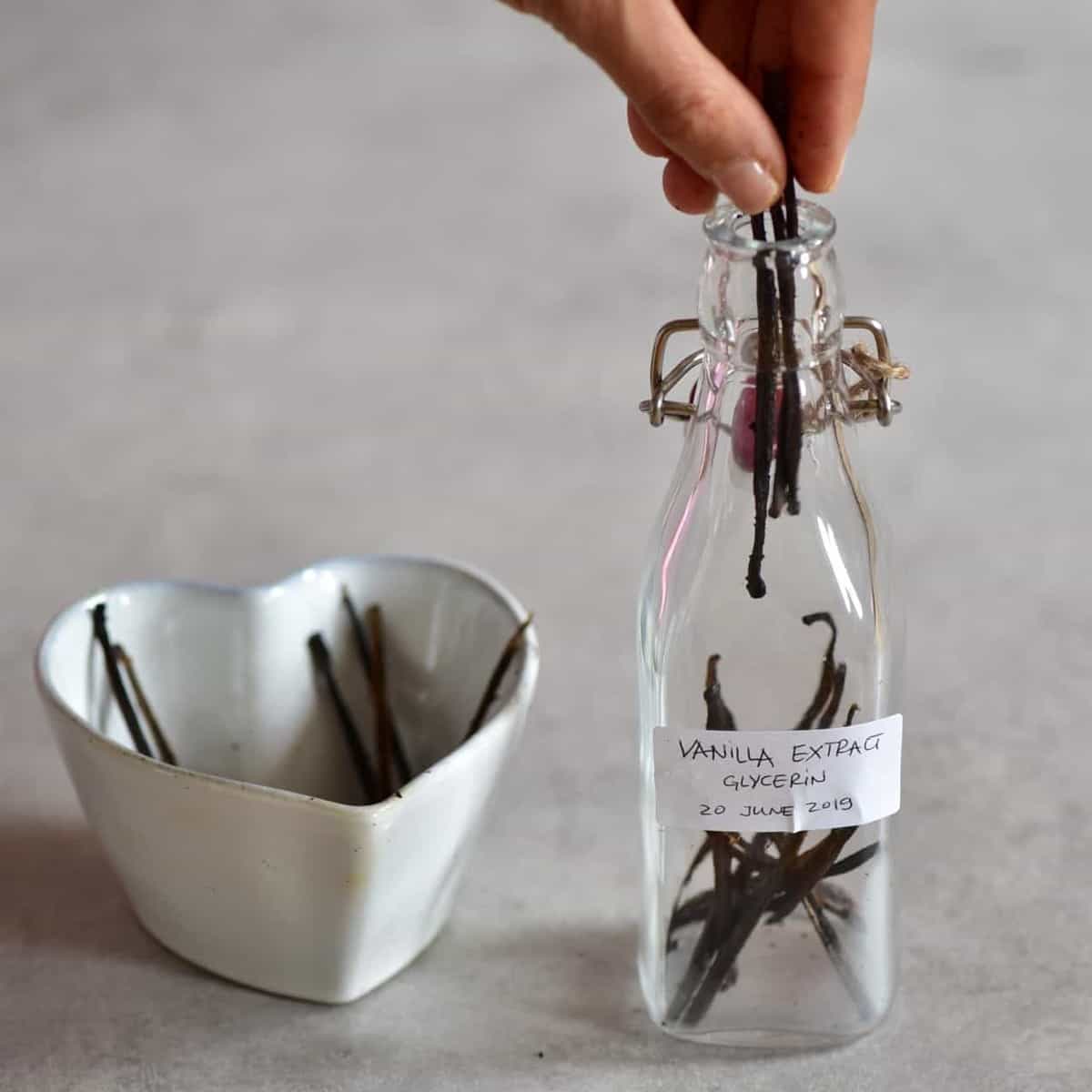 Bottle filled with vanilla pods