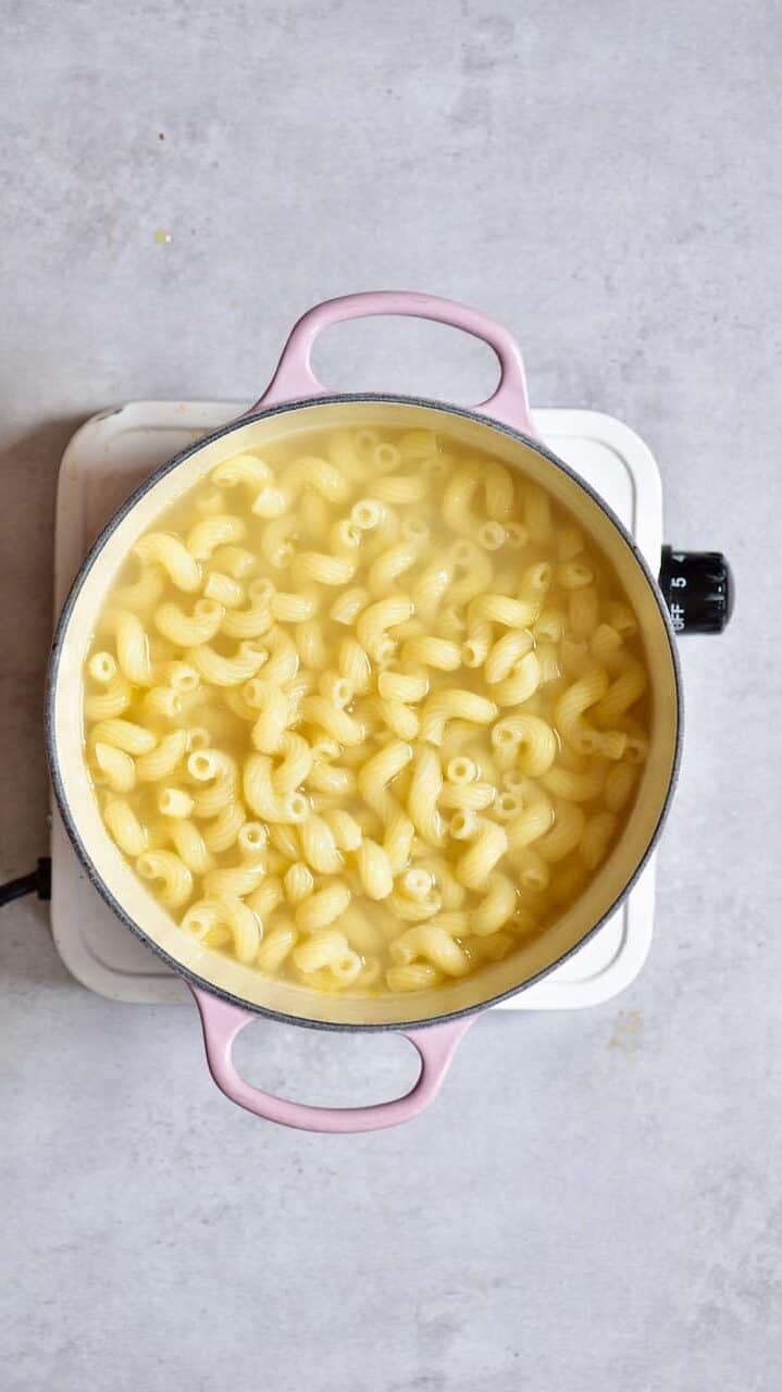 Cooking macaroni pasta in a pot