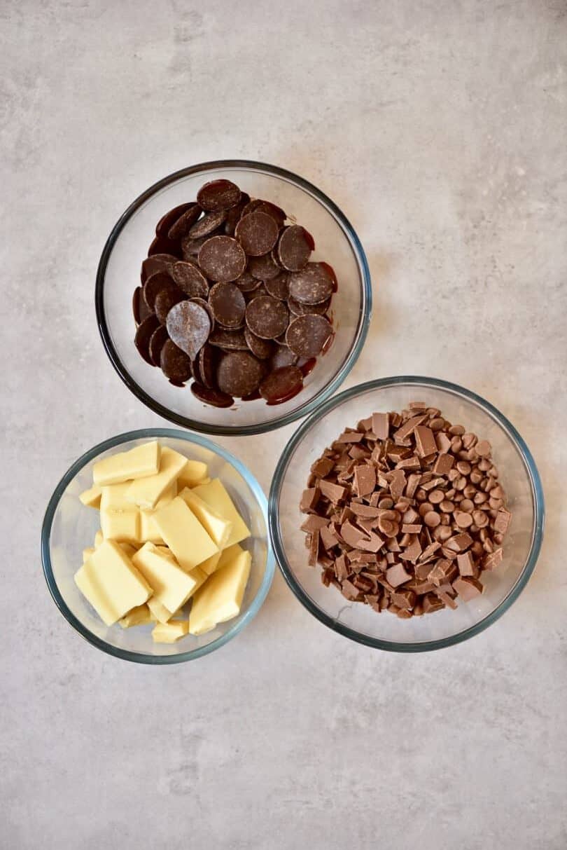 three types of chocolate in bowls