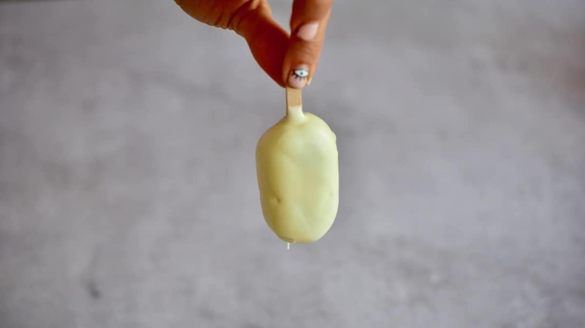 A homemade magnum ice cream covered with white chocolate 