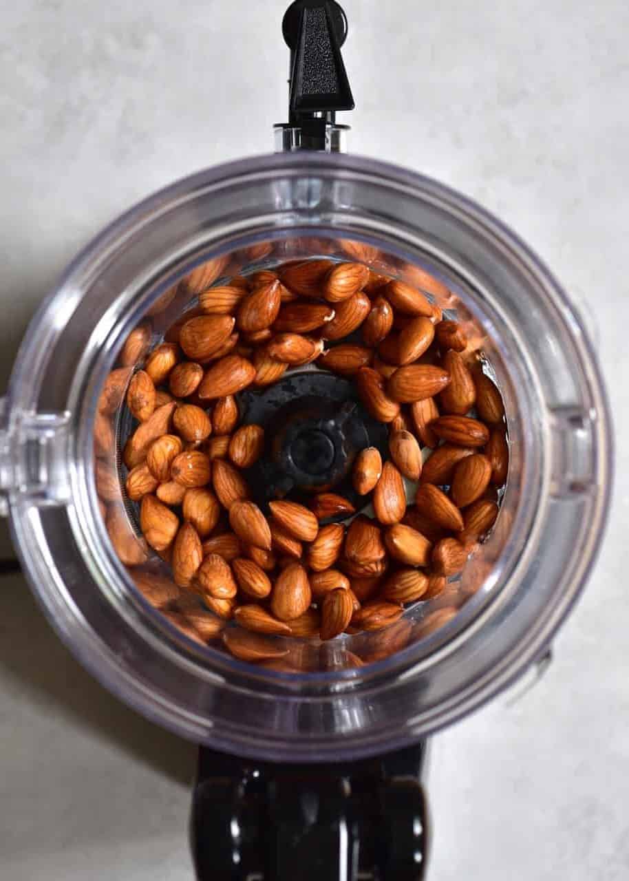 Blender filled with almonds and water