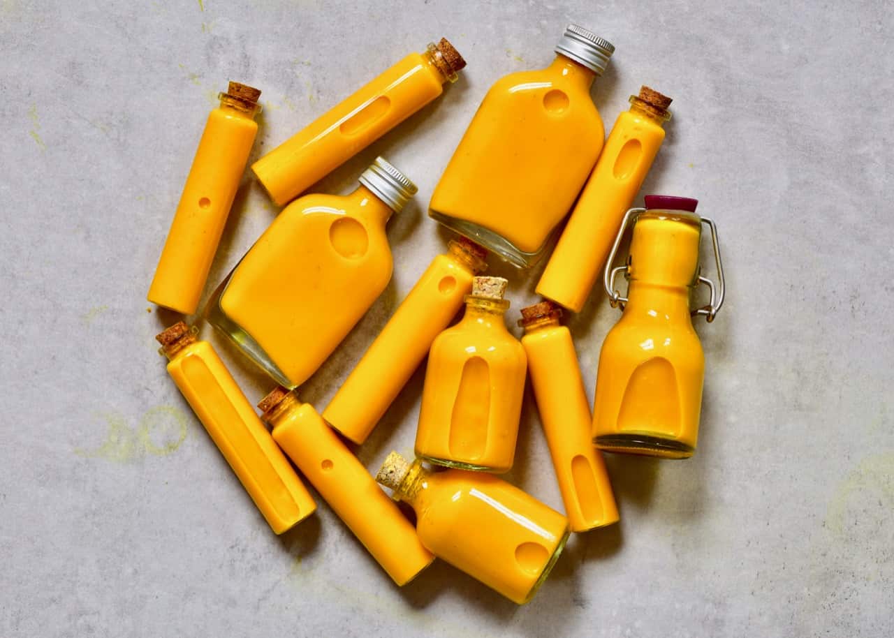 Small bottle with ginger and turmeric energy shots