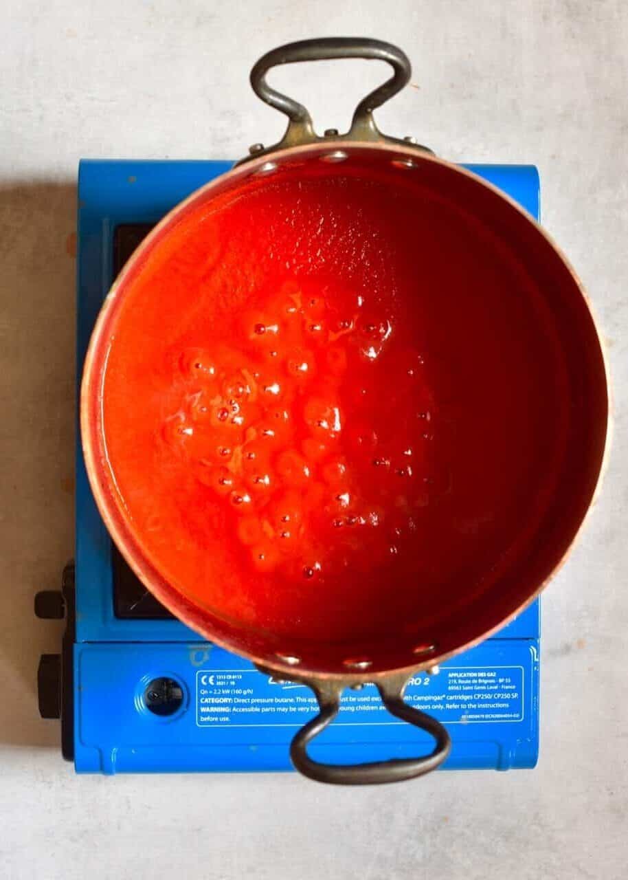 reduced tomato juice in a pot