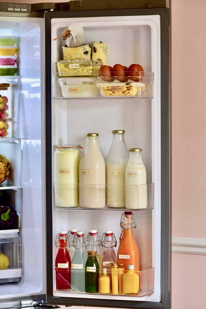 how to organise your fridge to reduce waste. what to keep in the fridge door. where to keep milk and dairy to make the most of their shelf life.