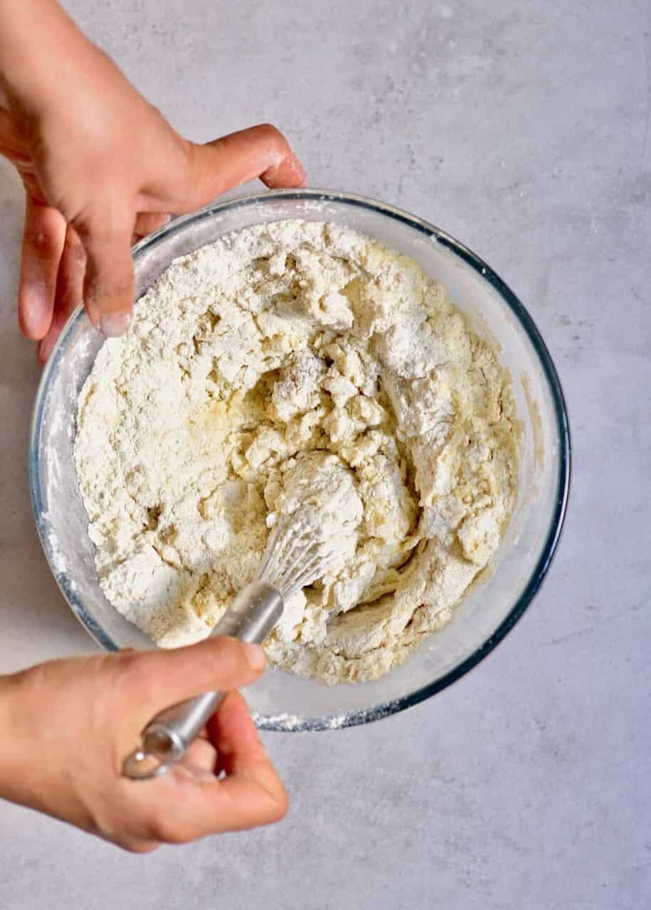 Mixing dough ingredients in a bowl