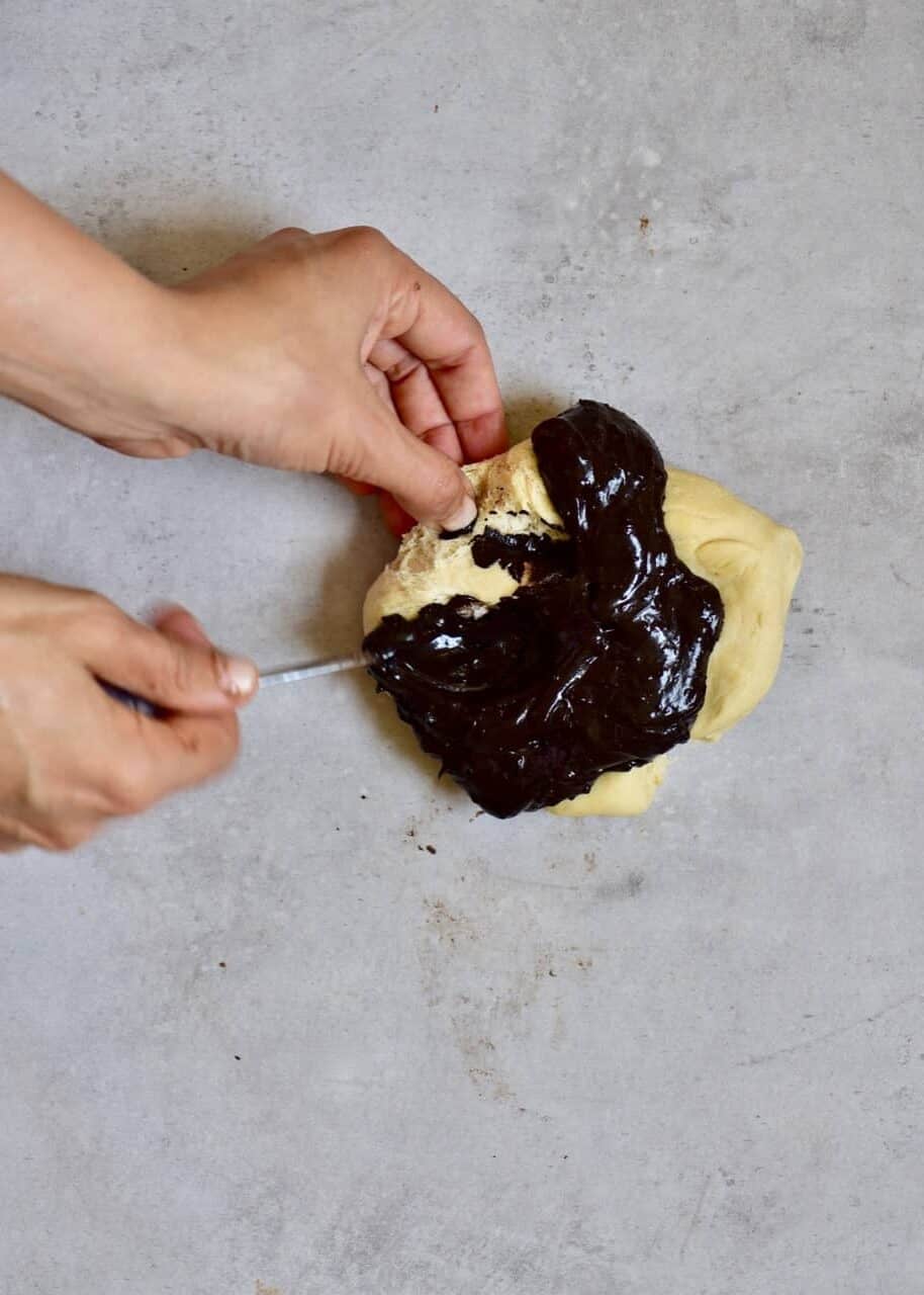 Mixing dough with dark chocolate