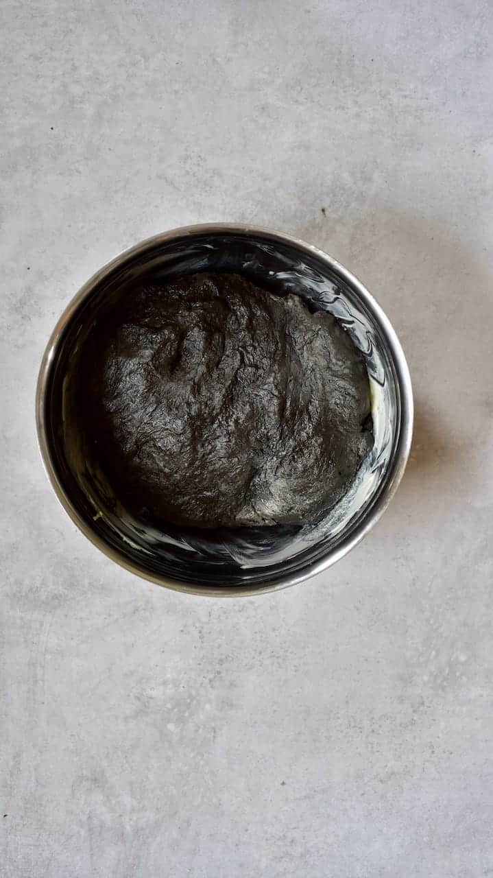 black squid ink dough ready in a bowl