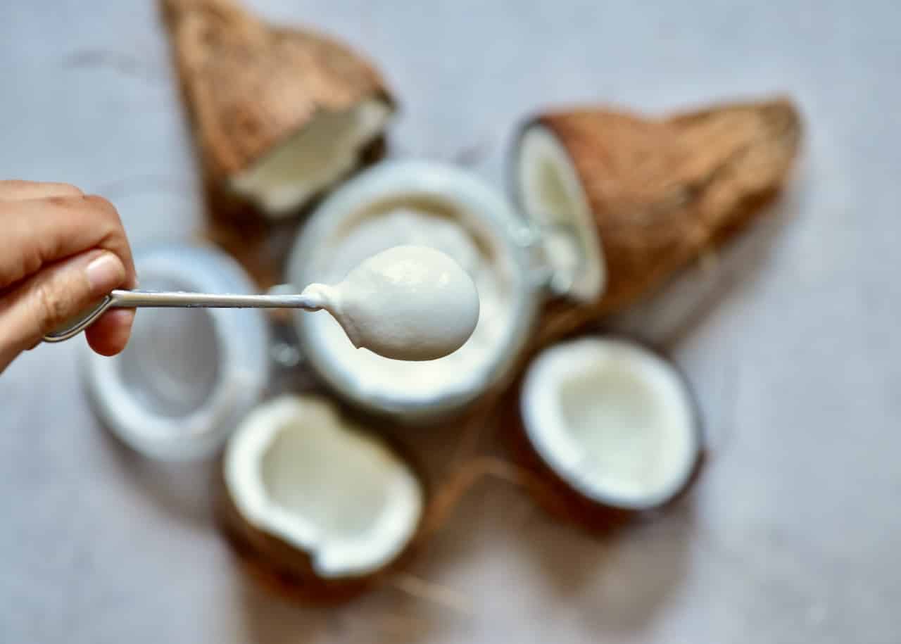 This delicious, super simple home-made coconut yogurt recipe is made with just 3 ingredients and yields a perfectly thick and tangy dairy-free yogurt!