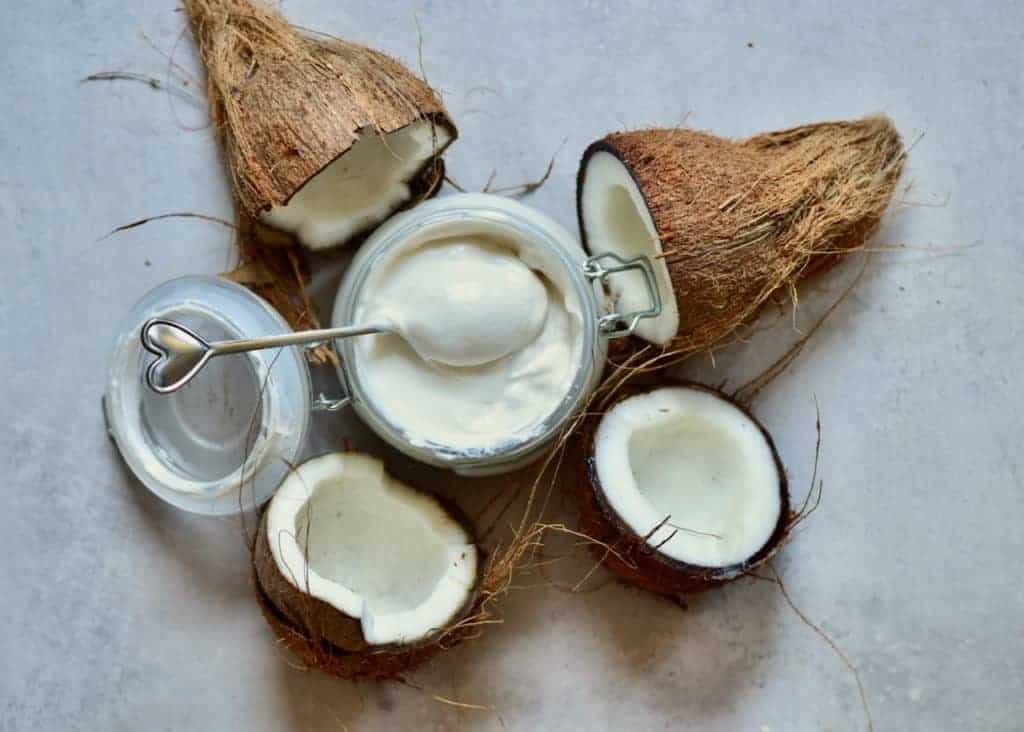 This delicious, super simple home-made coconut yogurt recipe is made with just 3 ingredients and yields a perfectly thick and tangy dairy-free yogurt!