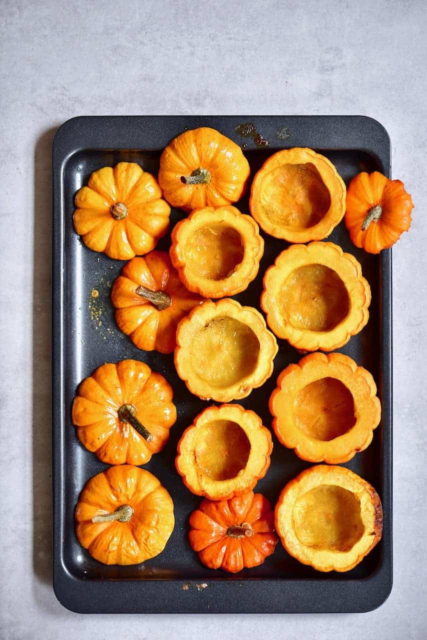 baked mini pumpkins on a tray
