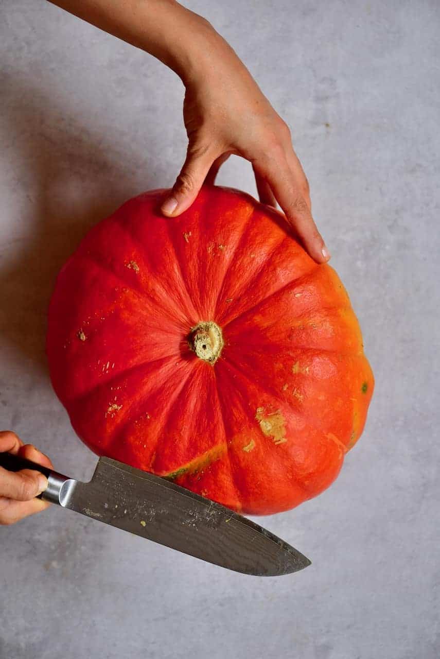 Opening a pumpkin with a knife