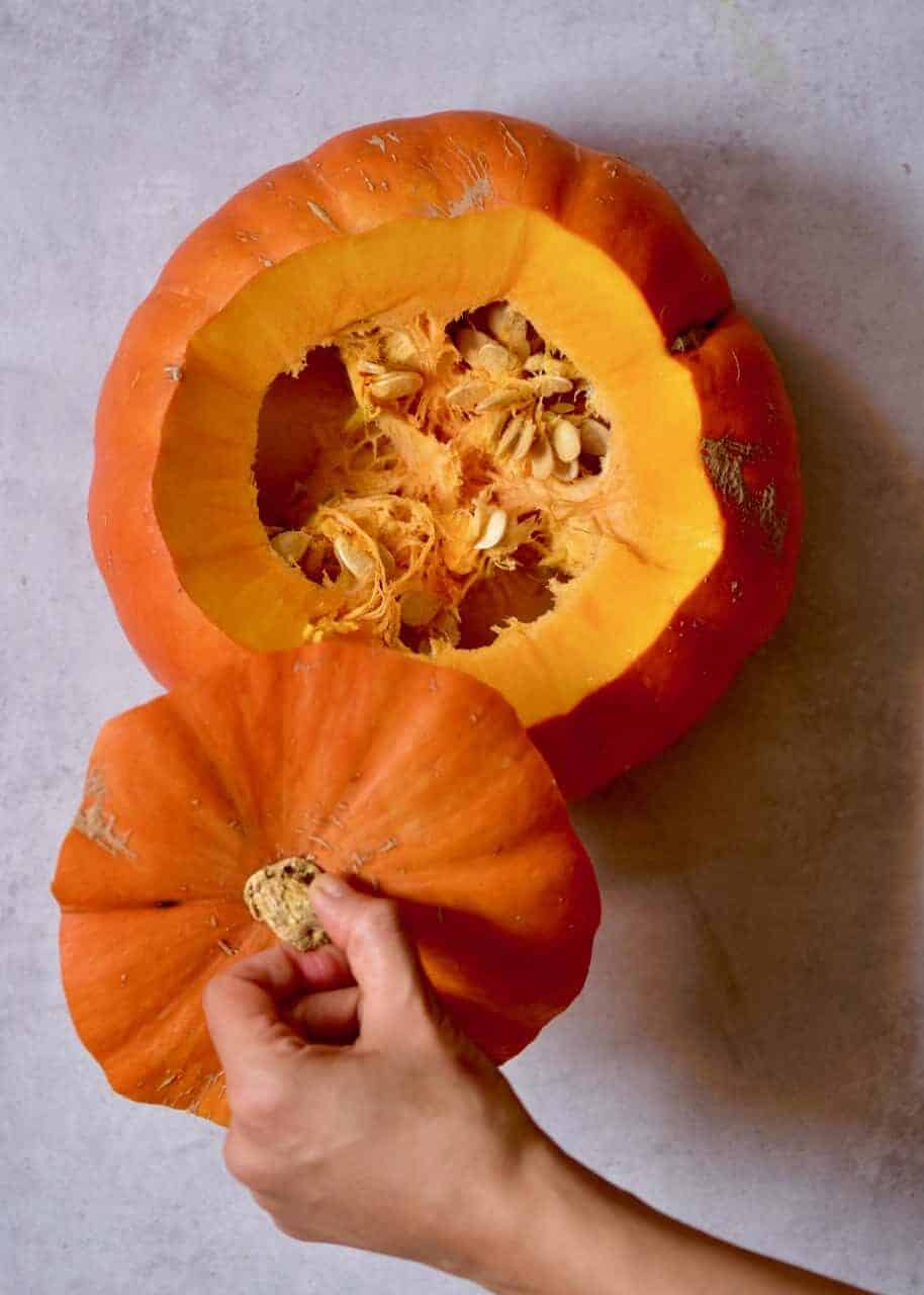 Removing the top of a pumpkin