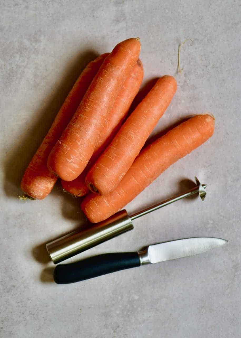 carrots with a knife and corer
