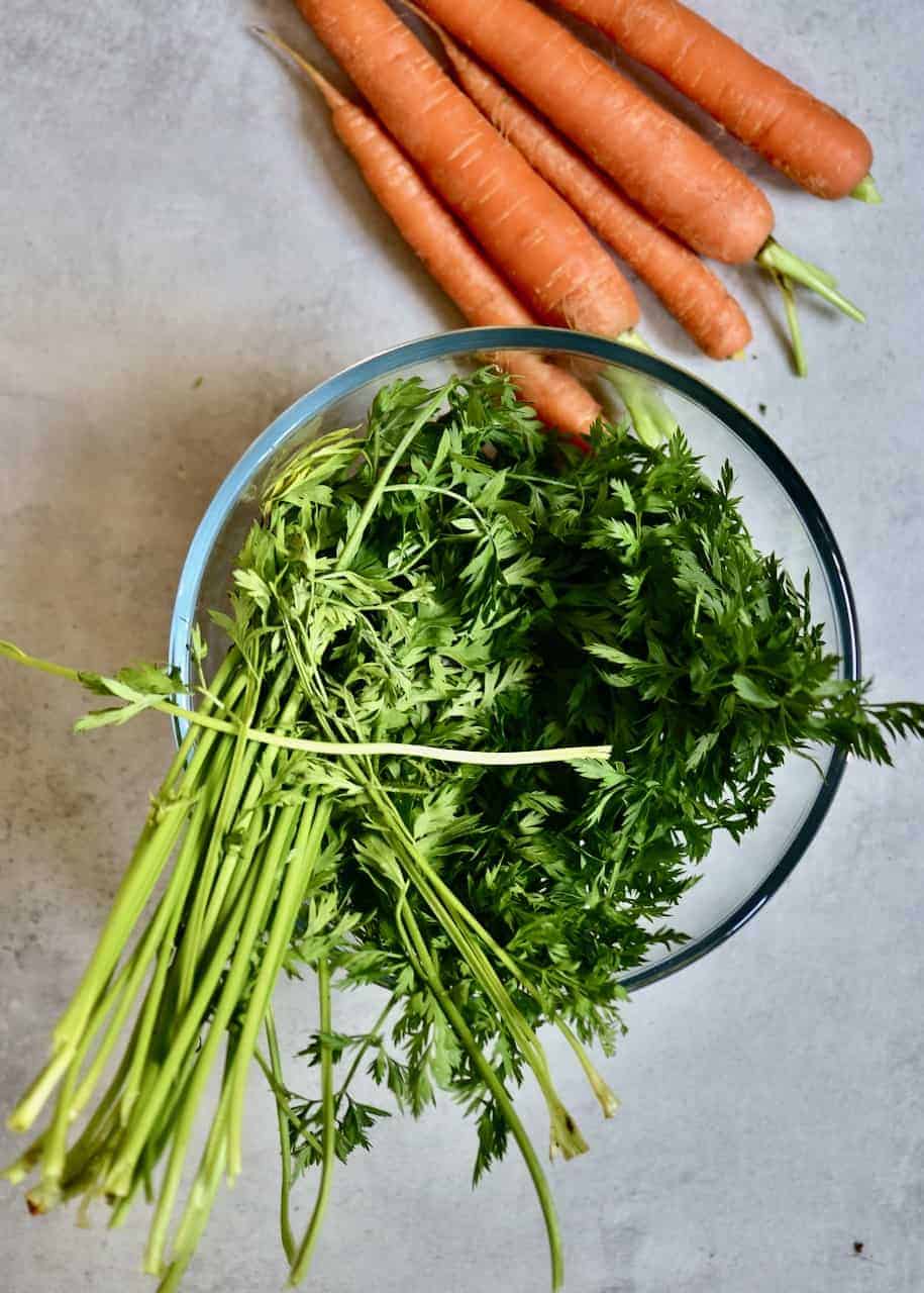 Carrot leaves in a bowl