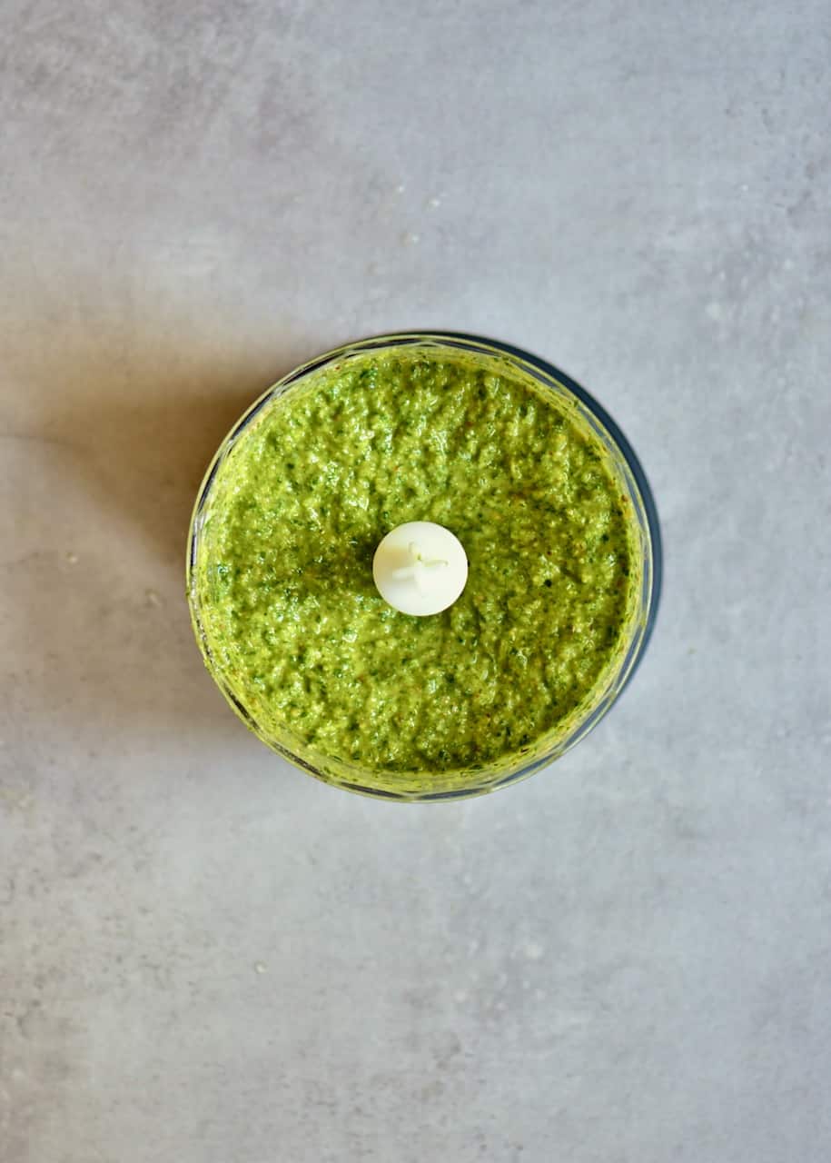 Carrot leaf pesto in a small blender
