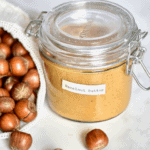 A delicious ONE ingredient homemade hazelnut butter recipe with flavoured hazelnut butter options, health benefits of hazelnuts & hazelnut butter uses! 