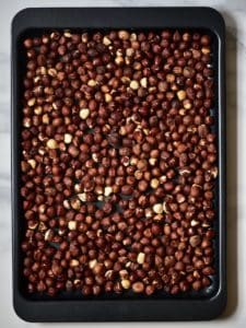 roasted hazelnuts in a tray 