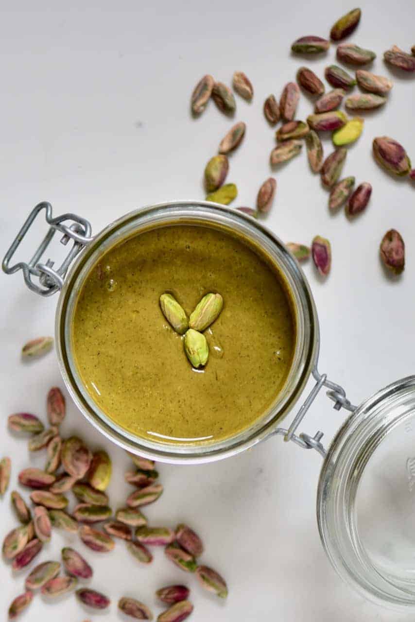 two-ingredient Homemade pistachio butter recipe with pistachio butter uses. Perfect for a DIY holiday gift and Edible Christmas gift