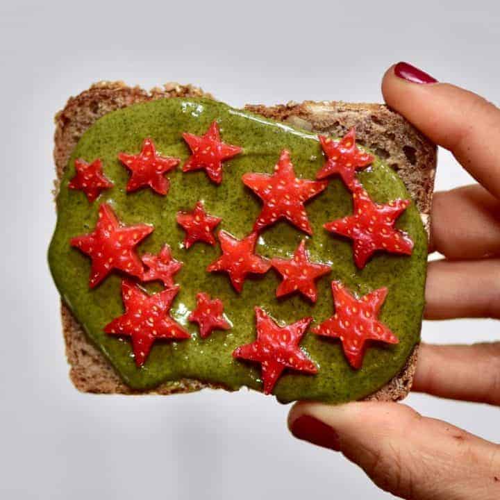 Christmas breakfast ideas perfect for christmas day breakfast - 9 healthy Christmas toast recipes including homemade nut butters, coconut yogurt and fruits. Plus these are easy Christmas recipes for Children - healthy toast with pumpkin seed butter and strawberry stars.
