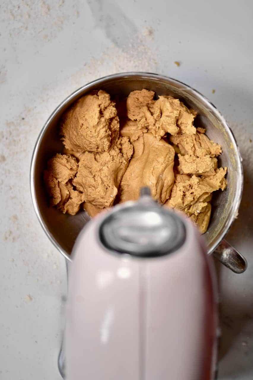 gingerbread cookie batter in a mixer