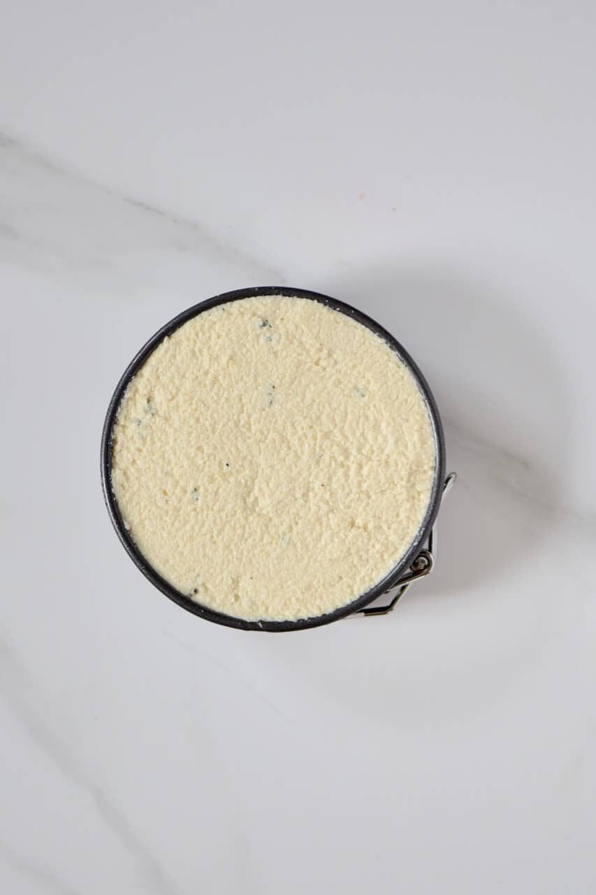 Cashew cheese preparation in a round mold