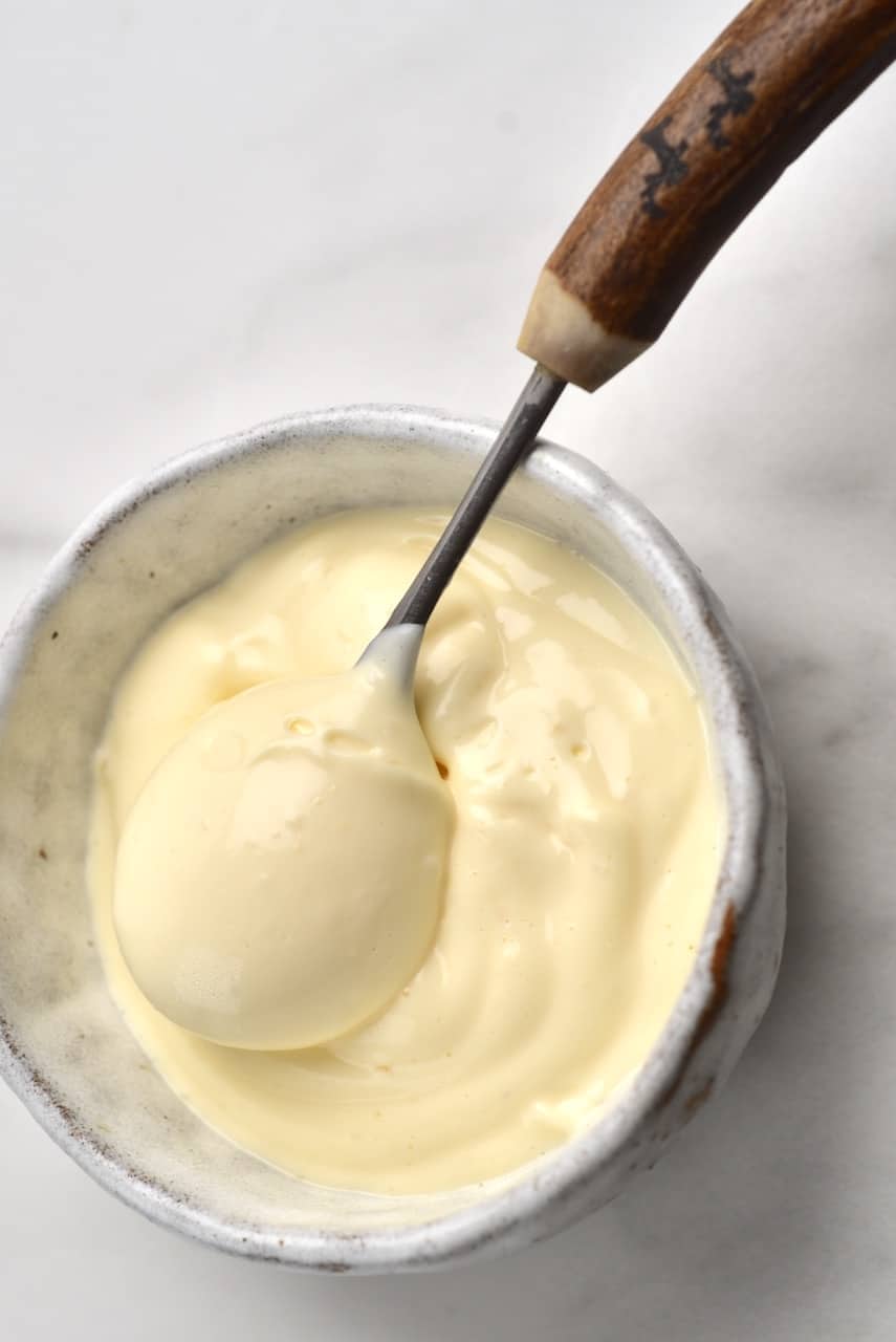 simple homemade mayonnaise recipe with 5 ingredients - in a small bowl