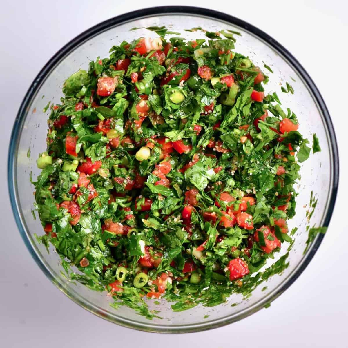 In a bowl, mixed fresh Tabbouleh/tabouli salad