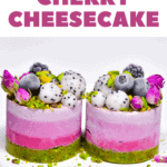 Delicious ombre pink and green raw vegan no-bake cheesecake with a gluten-free pistachio base and cashew nut based cherry cheesecake filling!