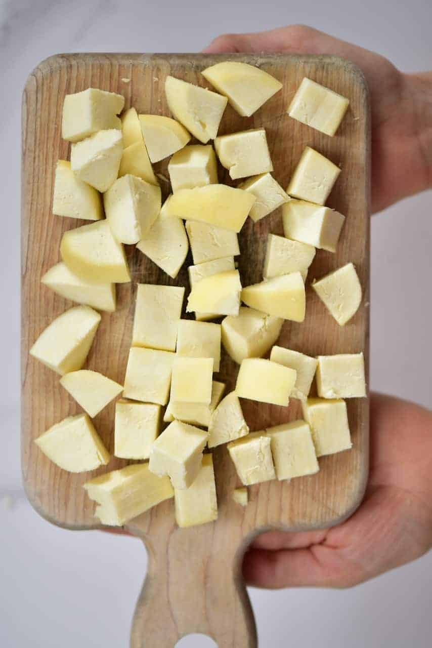 Cut Paneer On A Cutting Board Alphafoodie