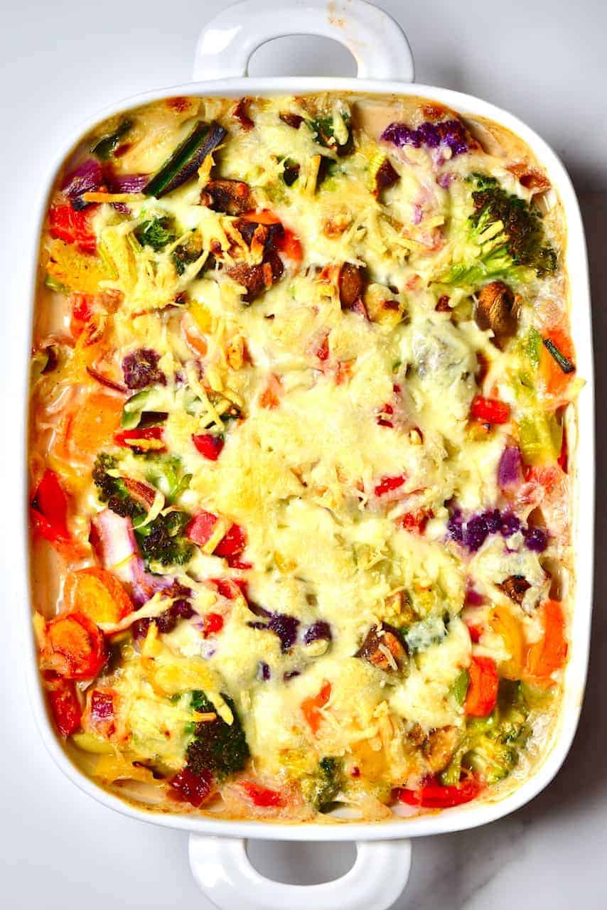 easy vegan bechamel pasta bake with rainbow vegetables.