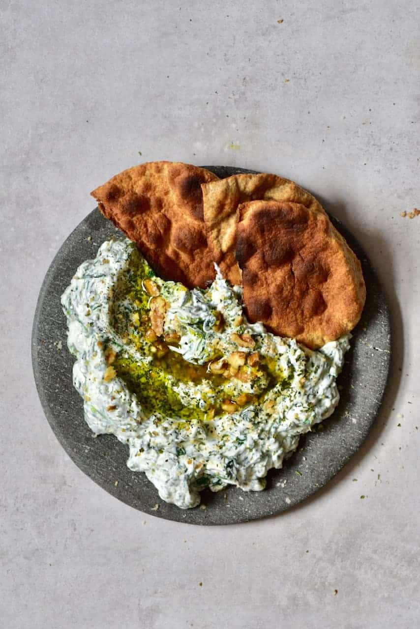 ready spinach dip with pita bread