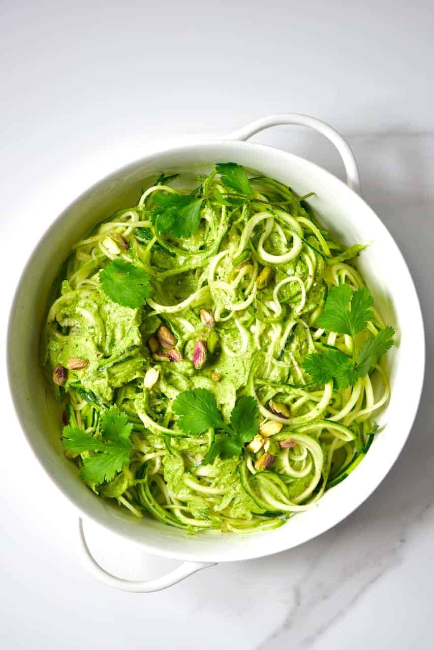 Zoodles with Pistachio pesto in a serving dish