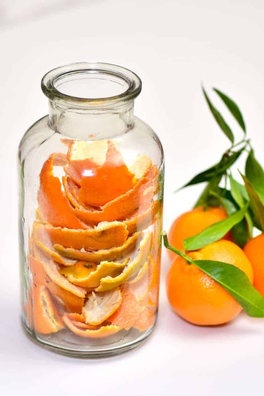 A jar filled with citrus peel