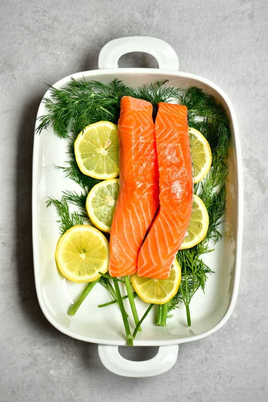 Salmon dill and lemon in a baking dish