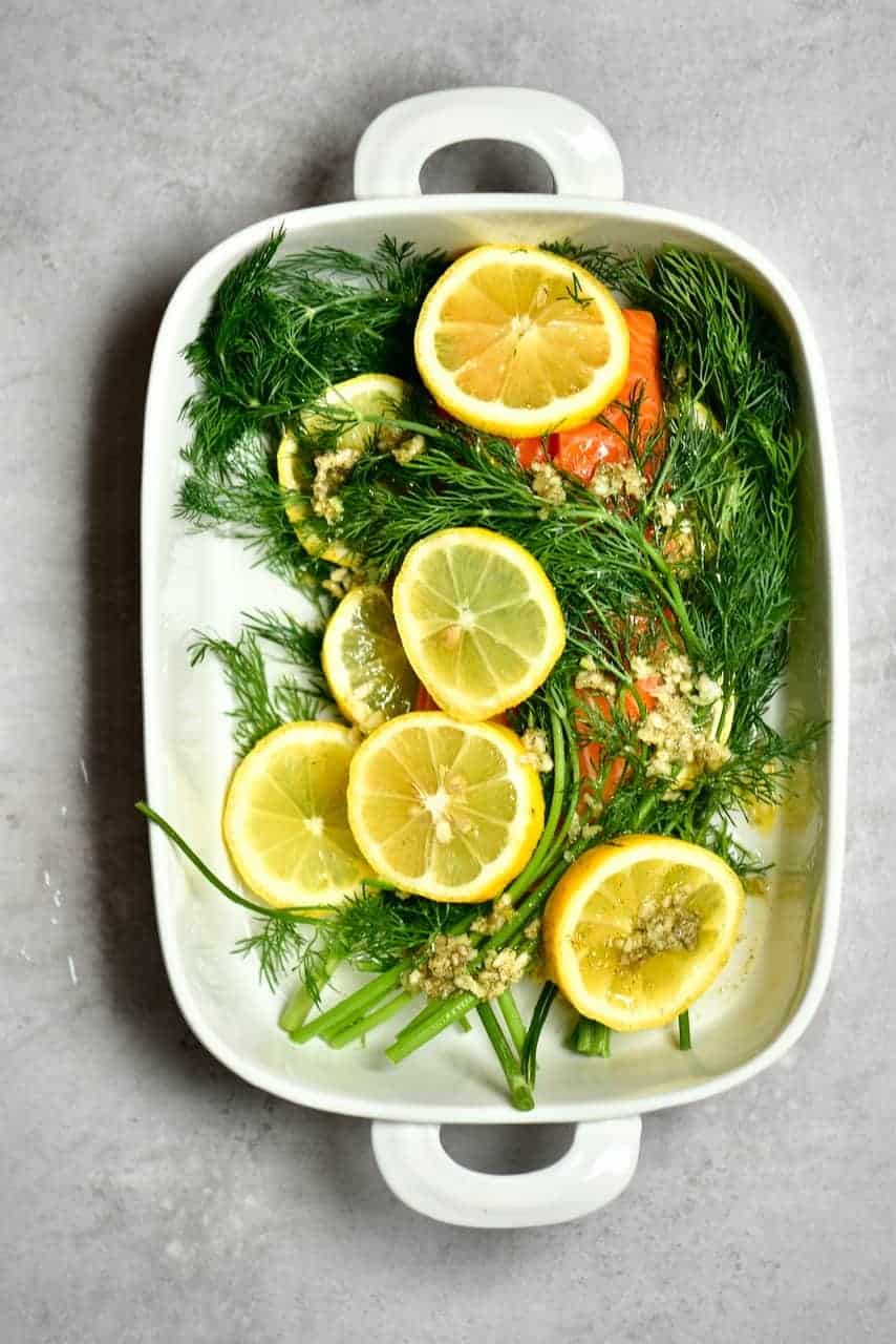 Salmon covered with dill and lemon
