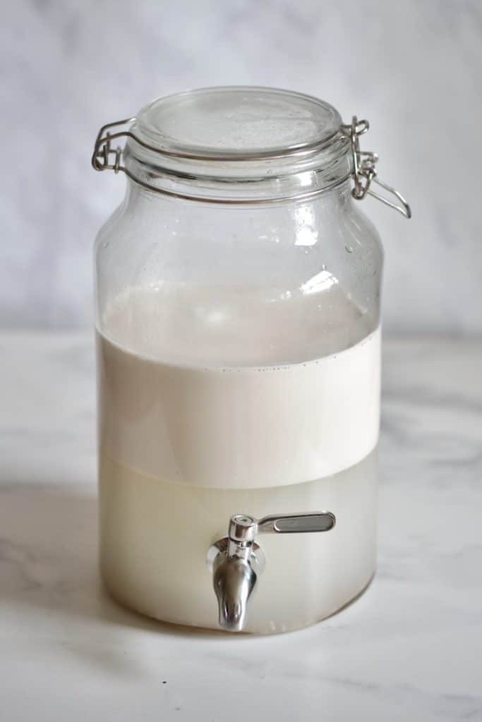 Coconut milk in a big dispenser jar