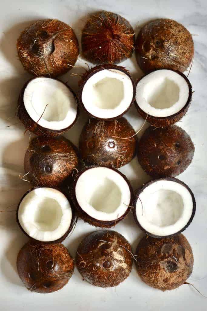 A bunch of open coconuts